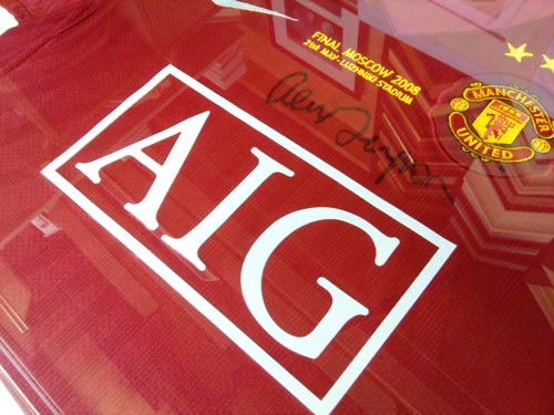 Manchester United shirt signed by Sir Alex Ferguson
