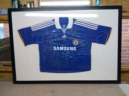 Framed signed Chelsea FC football shirt